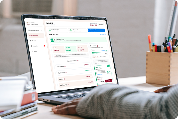 Close-up mockup of a MacBook Pro on a table (Mockuuups Studio)